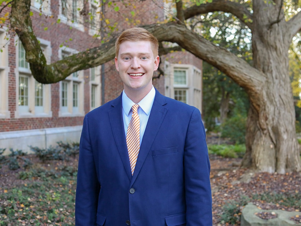 Headshot of Marshall Willett outside Morgan Hall.
