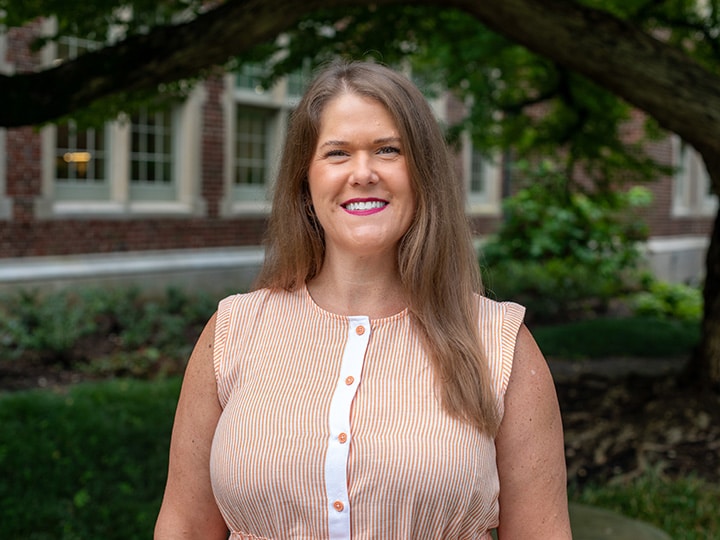 Headshot of Lauren Herbstritt outside Morgan Hall.