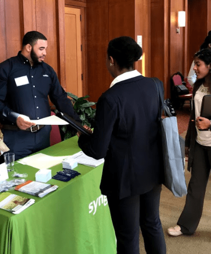 Student Engaging with Employer at Herbert College career fair 