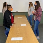 Graduate students participate in a meet-and-greet at a Mindfulness workshop.