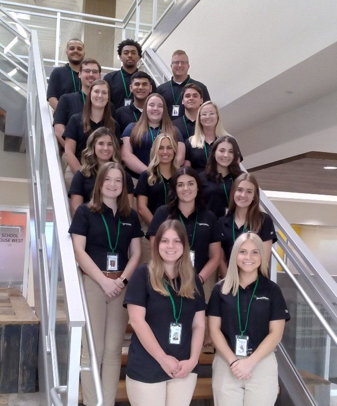 Group of 2022 Farm Credit Scholars Interns pose for picture on staircase